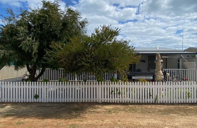 This beach house is full of character and is the perfect way to relax while spending quality time wi