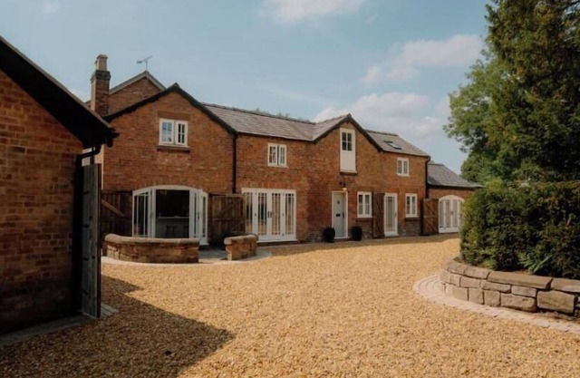 This historic building offers an inviting retreat with its charming blend of comfort and elegance.