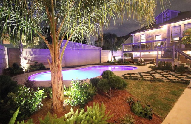THIS STUNNING AND SPACIOUS UPTOWN OASIS HAS A POOL AND HOT TUB!