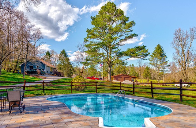 Three wonderful cabins on the river with pool, hot tub, fishings, & waterfall