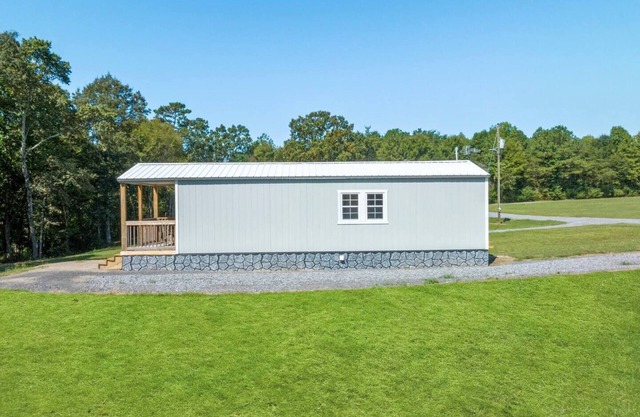 Tiny cabin on 10 acres with pond