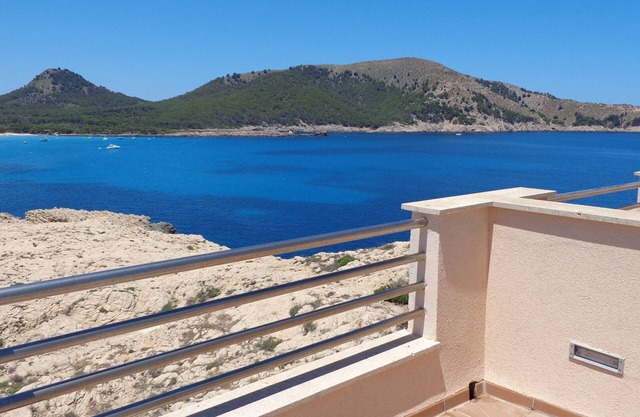 Townhouse on the seafront in Cala Lliteras
