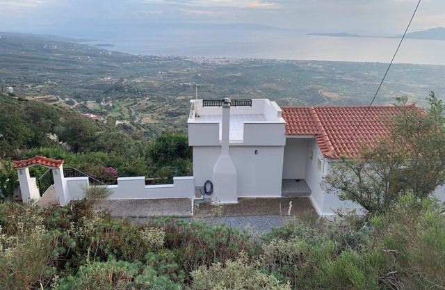 Tranquil house in hillside Greek village with panoramic sea views!
