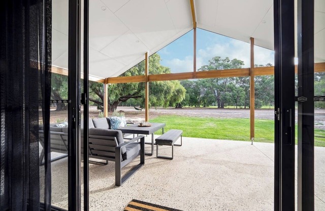 Turf and Surf Luxe Retreat Backing onto Golf Course