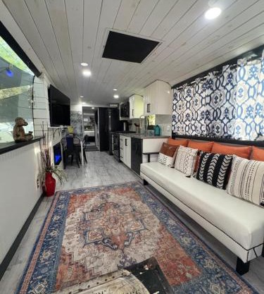 Unique Adventure Awaits in This Custom Tour Bus Conversion!
