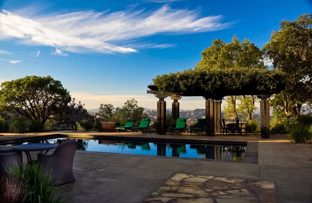 Unique mountain estate with a private pool, hot tub, deluxe kitchen, & views