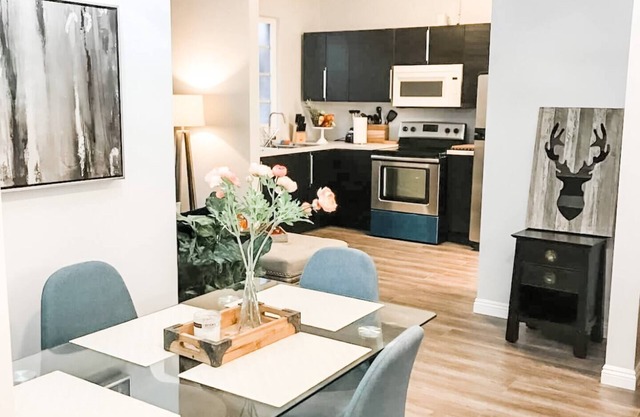 UNIT #1 2-bedroom/1-bath 500 sq. ft suite with Parking & 4 Beds including a full kitchen