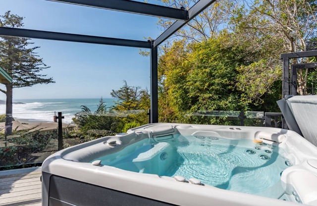 Updated home with ocean views, private hot tub, fire table, outdoor kitchen