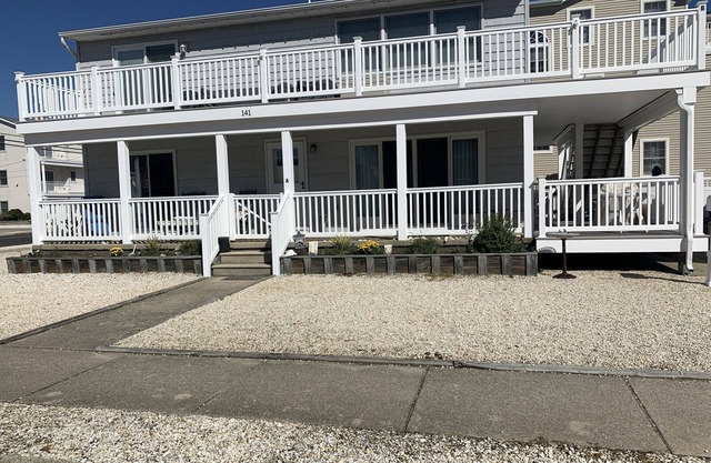 Views! Big wrap around deck w/views of the bay & sunset & still close to beach!