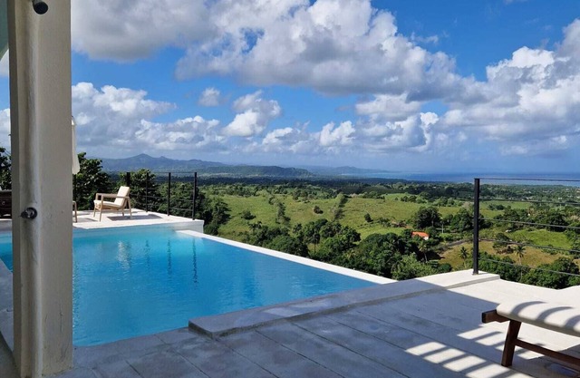 Villa elevated on a hill overlooking a majestic view of the sea