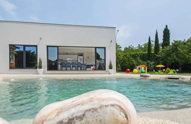 Villa with hydromassage pool and children's playground