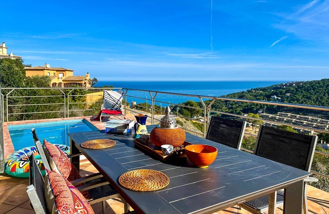 Villa with stunning sea views and pool in terrace.