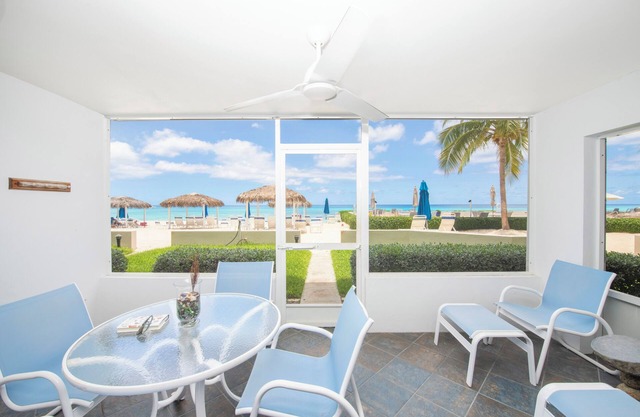 Walk out the door onto 7-Mile Beach! Discovery Point Club #28