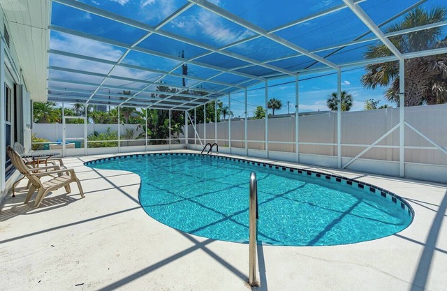 Walk to Beach – 3BR w/Heated Pool & Fenced Yard