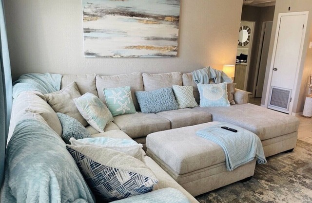 Walk to the beach! Spacious home with comfy beds, game room, & fenced yard.