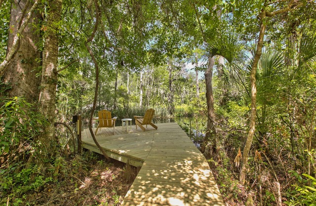 Watch the Manatees Swim by from This Peaceful Retreat with a Private Dock
