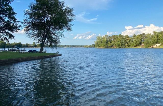 Water Views Everywhere - Lake Front Cottage with Private Dock and Boat Ramp