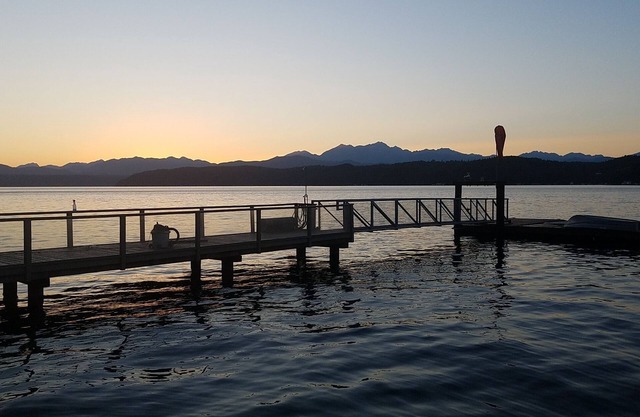 Waterfront home with dock, spacious deck & picturesque views