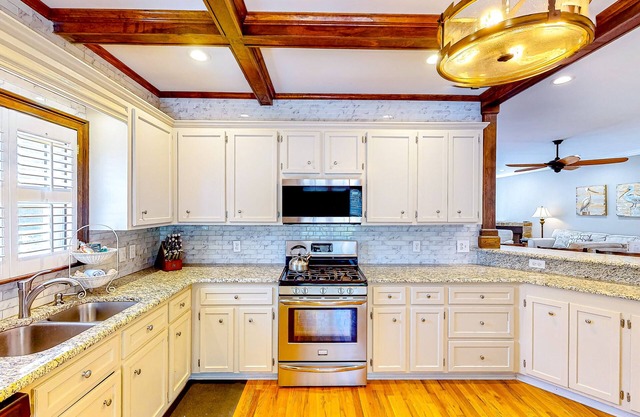 Waterfront home with private dock, boat ramp, large deck, grill, & W/D