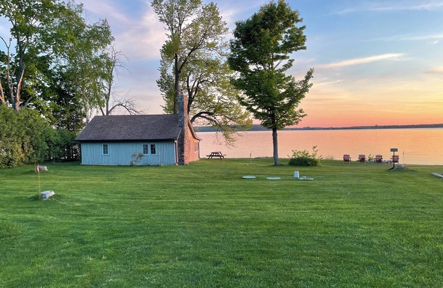 Waterfront Log Cabin | Sunset Views, Fire Pit, Screened Porch