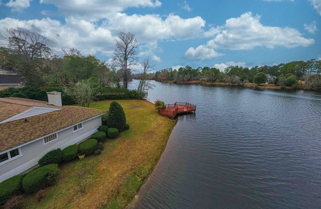 Waterfront Paradise with Golf Course Views