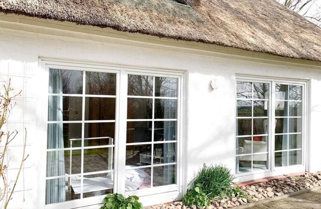 Weiße Reetdachkate, Deutschland