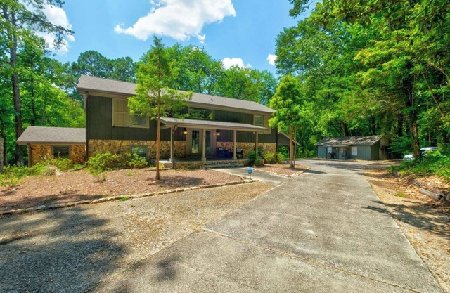 Welcome to your Gorgeous Lake Side oasis in the heart of Newnan, Georgia! This 3-bed, 3-bath (2 pull out sofa beds). The Lake is perched on 11 acres of private and peaceful land, providing the perfect getaway for families or couples.