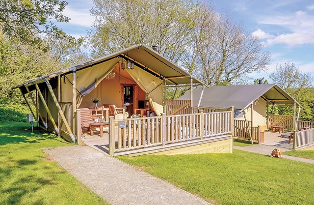 Well equipped bespoke safari tent with four poster double.