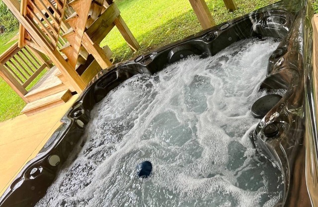 Wooded Retreat with game area and hot tub!