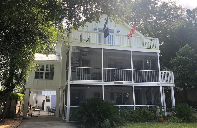 Your Perfect Island Getaway Only 250 Yards from Beach! 1st Floor of Duplex House