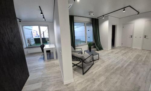 Shevchenkivs'kyi District Apartment | Апартаменти з терасою в центрі міста