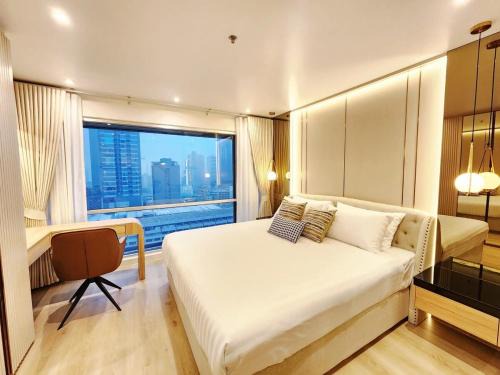 Khlong Toei Nuea Apartment | คอนโดสุขุมวิทสวีท เรียบหรู อบอุ่น ครบครัน