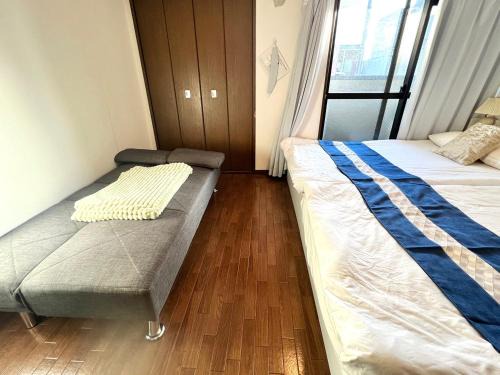 Naniwa Apartment | 大国町駅徒歩3分 なんば駅1駅 最大6名 ロイヤル603