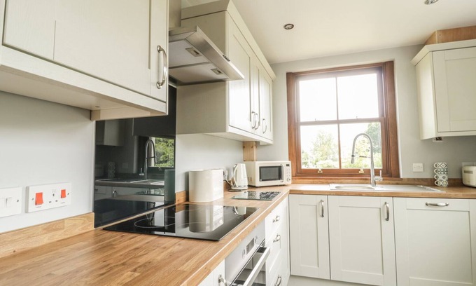 Mealsgate Cottage | 1 LEESRIGG COTTAGES, pet friendly, with open fire in Aspatria
