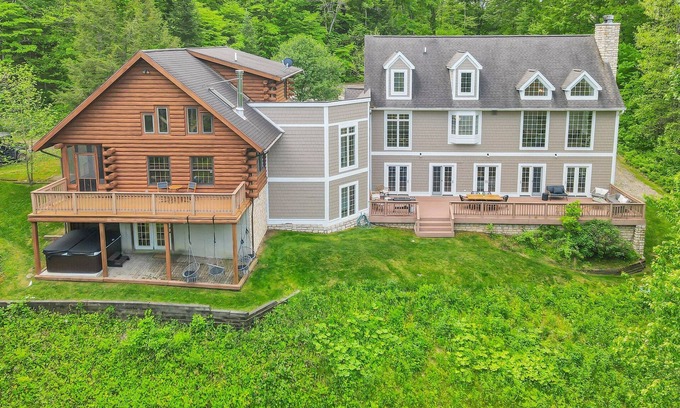 Logan Villa | 11,000sqft sleeps 29, POOL! lake swimming & fishing, hot tub, sauna, 130 acres!