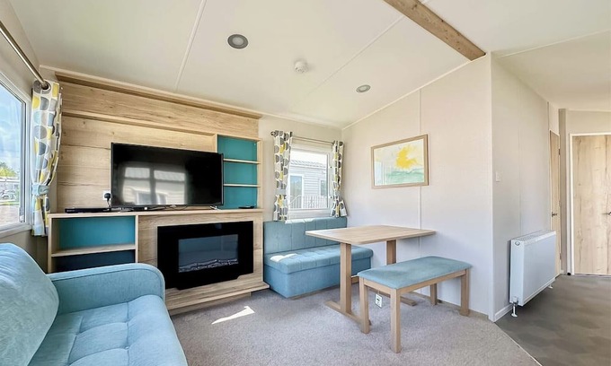 Cross Inn House | 12ft-wide caravan with one double and one twin.