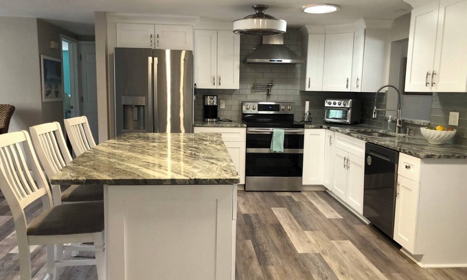 Port Richey House | 2/2 Canal Front w/10,000 covered boat lift and floating dock.