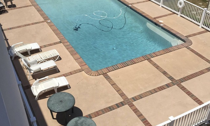 Wildwood Crest Condo | 2-Bd Condo, Pool and Views of Sunset Lake. Watch the fireworks from the porch!