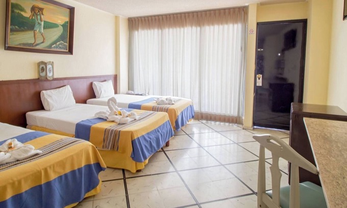 Merida Municipality Hotel | 2 Triple Rooms at Mérida, Perfect for Families & Poolside Relaxation