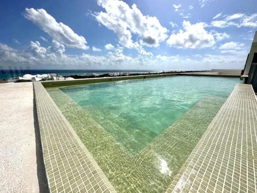 Centro Apartment | 2BR Modern Condo - Rooftop Pool with Stunning Views
