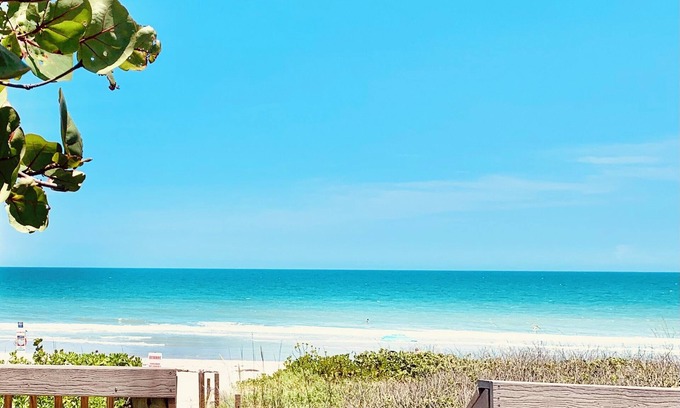 Melbourne Beach House | 3/3 Beachside Stylish Retreat: Hanging Bed, Steps to Sand & Private Ocean Access