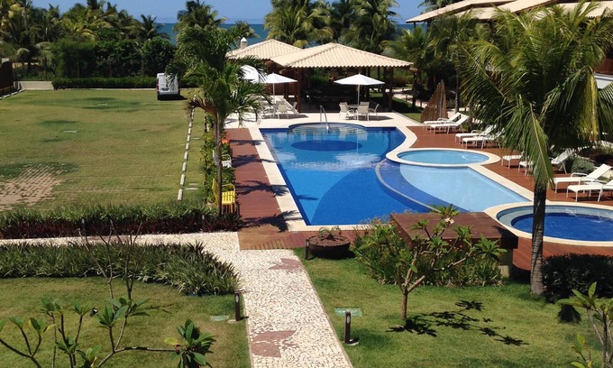 Itacimirim Apartment | 3 SUITES WITH AIR CONDITIONING, WIFI, COMFORT, SECURITY, SWIMMING POOLS, SEA VIEW.