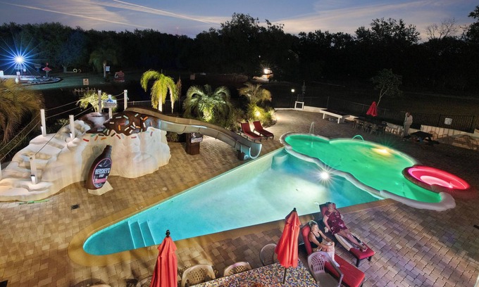 Clermont Villa | 5 Acre Estate With 11 Bedrooms & Giant Pool w/Slide, Splash Park, & Crazy Golf!
