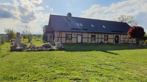 Mellenthin Apartment | 5 Sterne Ferienwohnung Dewichow mit Wasserblick & WLAN