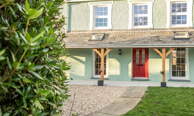 Aberporth House | A beautifully renovated farm house on the coast with a hot tub & outdoor bar