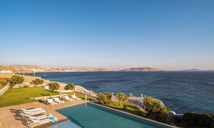 Agios Stefanos Villa | A luxurious haven of beachfront comfort and elegance!