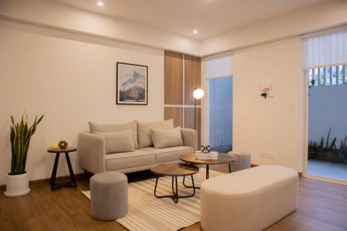 Armendariz Apartment | Acacias Coastal Apartment by Wynwood House
