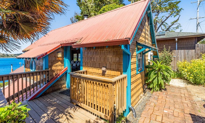 Old Town Cottage | Adorable waterfront cottage with private hot tub, deck, & wood stove