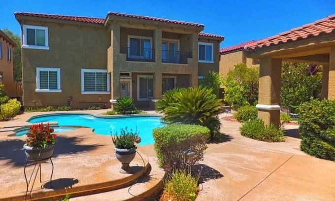 Enterprise Bed & Breakfast | All the amenities You could ask for and minutes from strip with pool and spa!