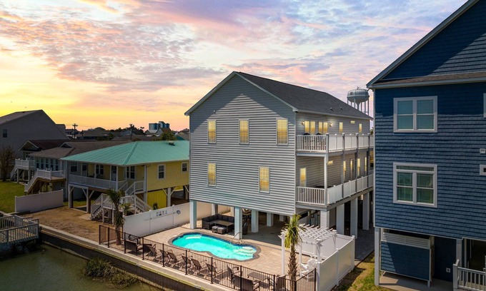 Cherry Grove Beach House | Amazing Channel Retreat Private Heated Pool Luxury Outdoor Living & Pet Friendly